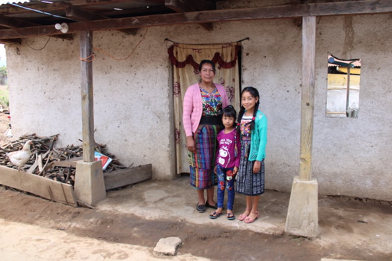 mom with children outside home