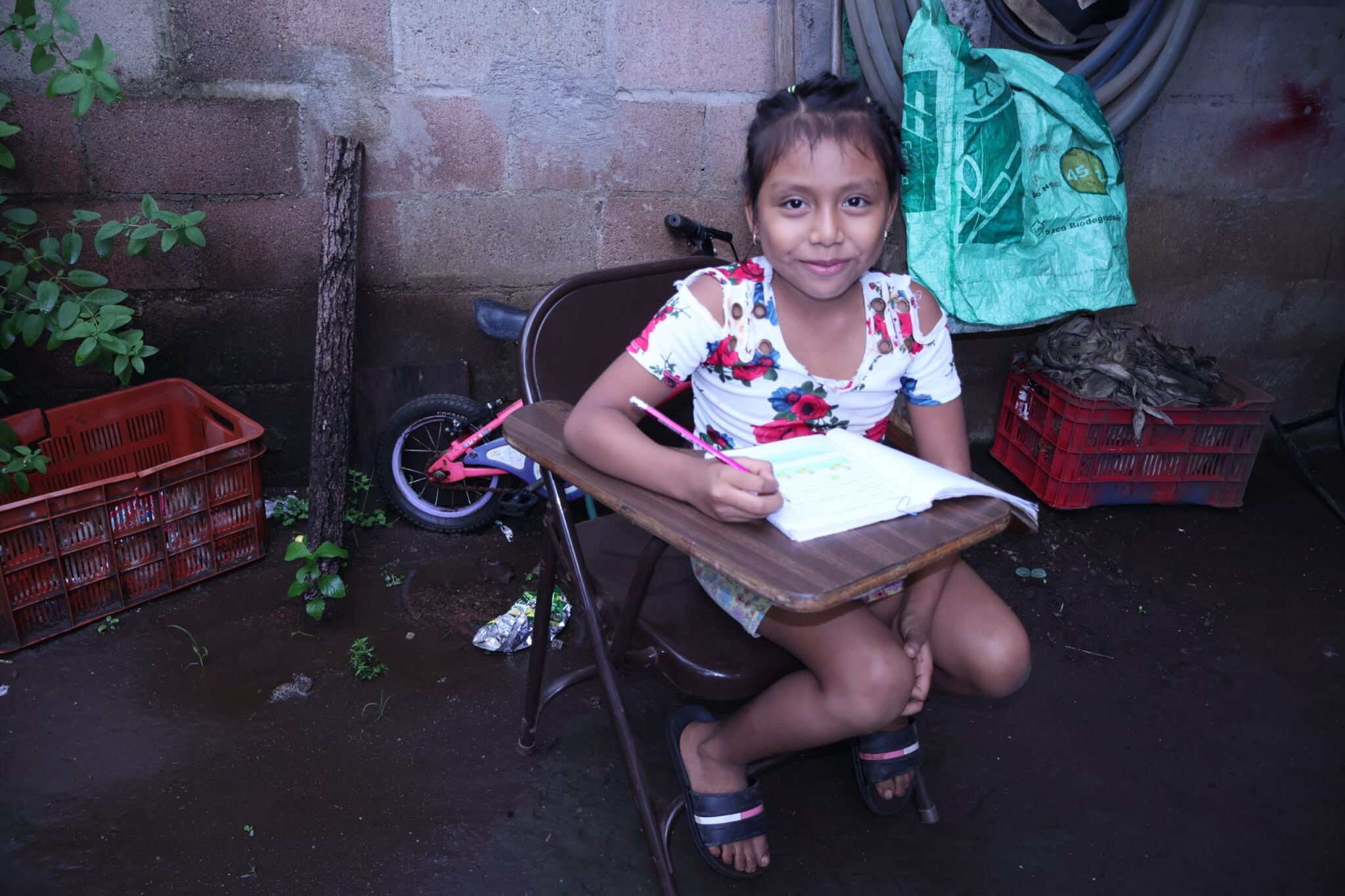 Maritza at her small desk