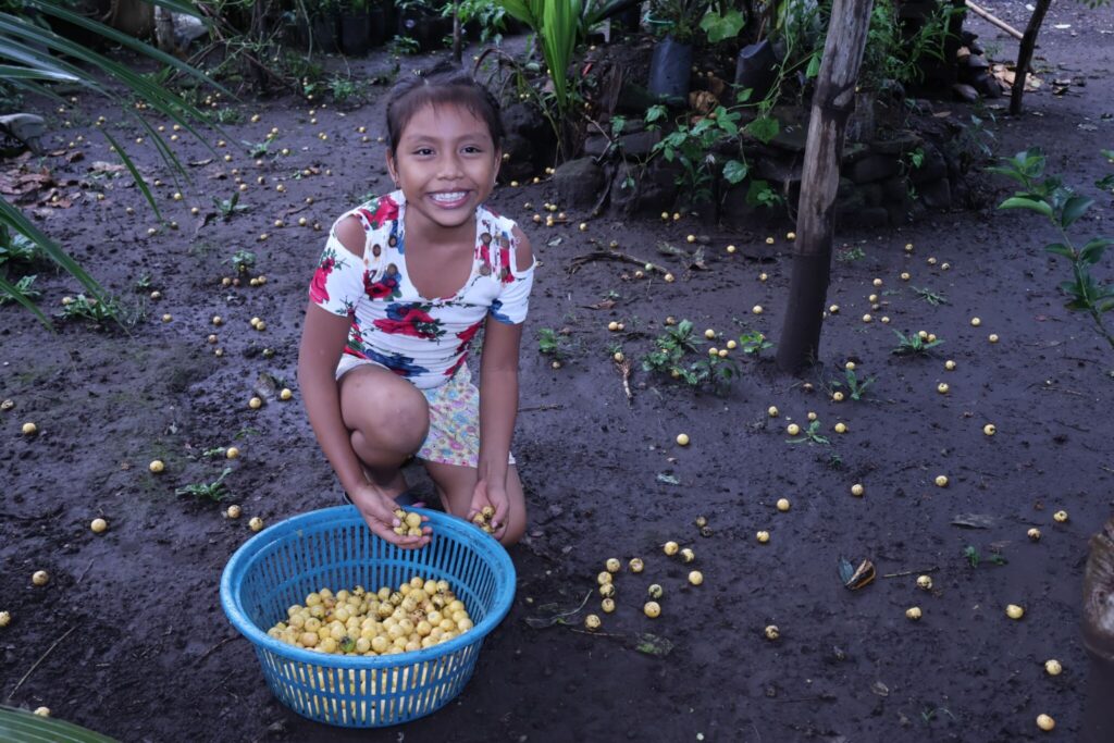 Mariza with her collection basket.