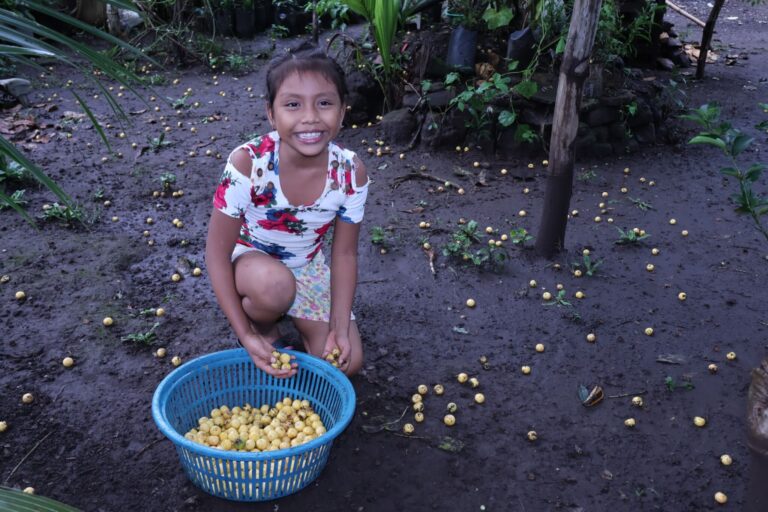 Mariza with her collection basket.