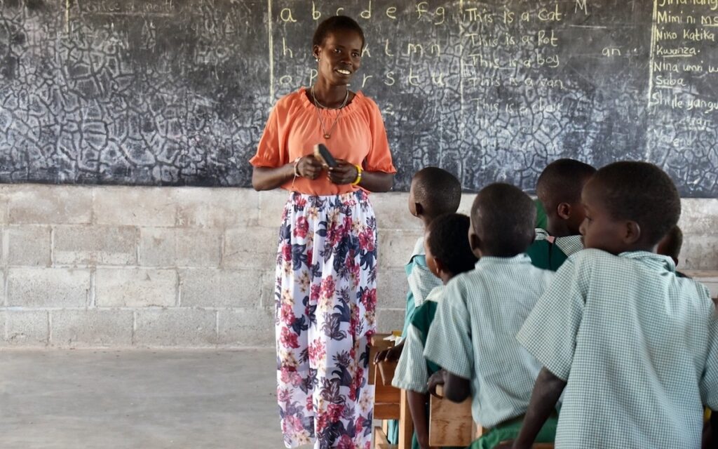Alesia teaching a classroom in Kenya.